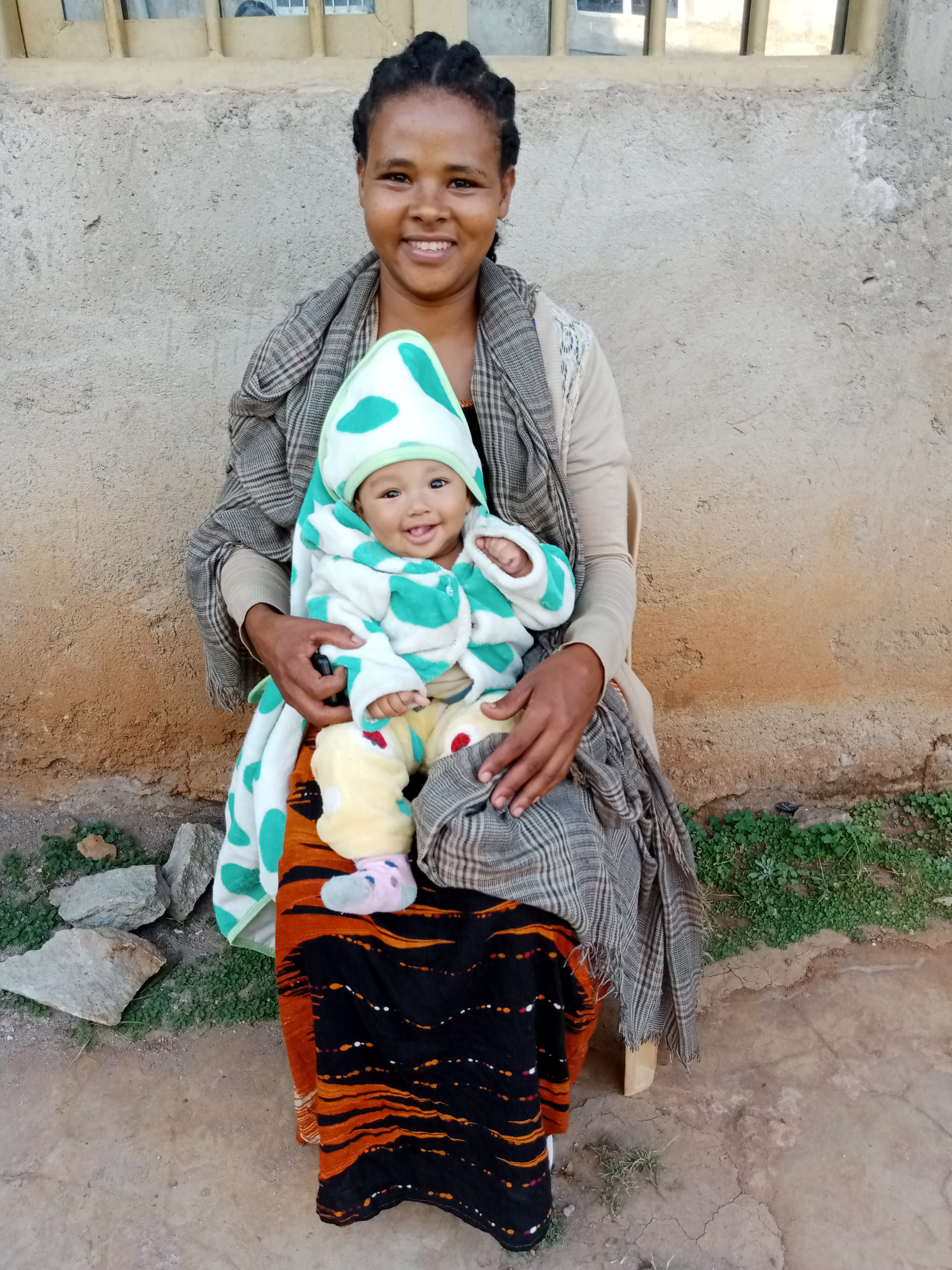 Wagaye holds baby